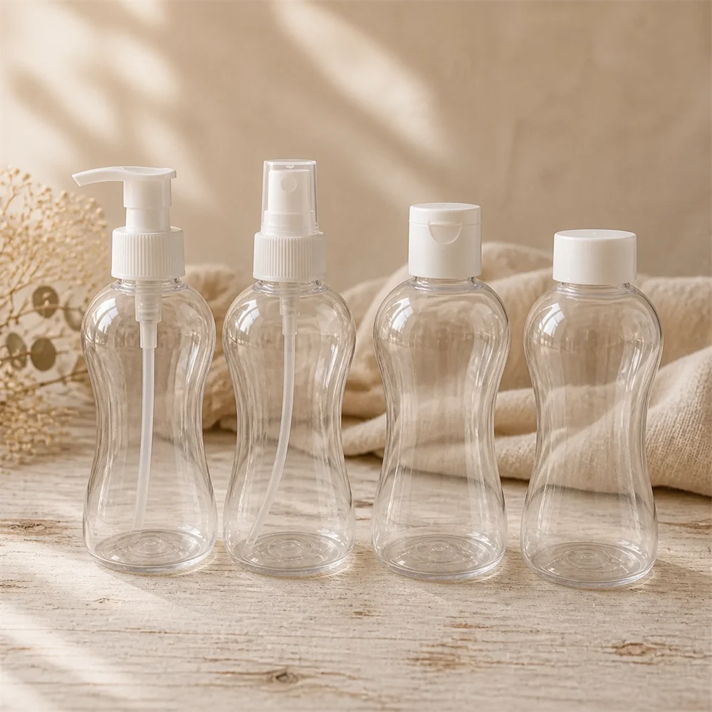 Four clear PET Bella bottles fitted with matt white closures: lotion pump, mist spray, flip cap and screw cap