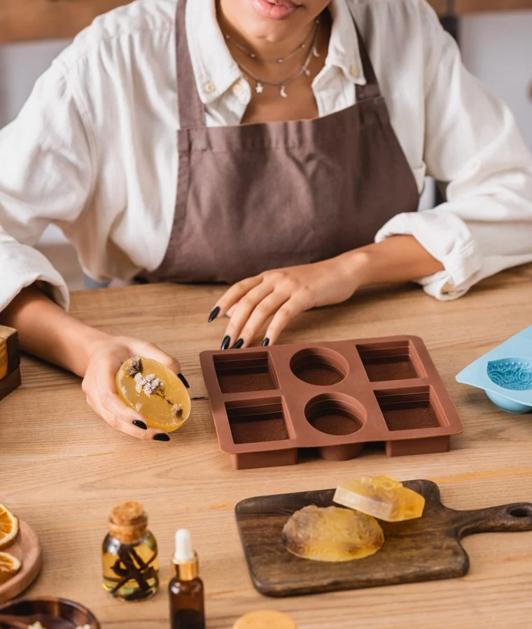 Craftswoman making soap